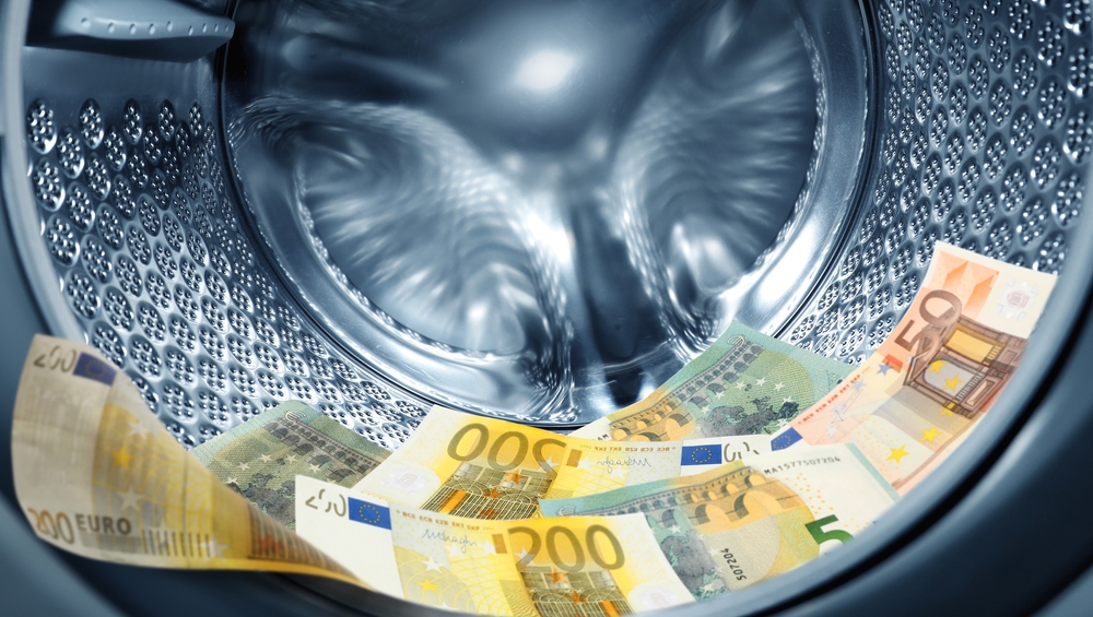 Money,Laundering.,Many,Euro,Banknotes,In,Washing,Machine